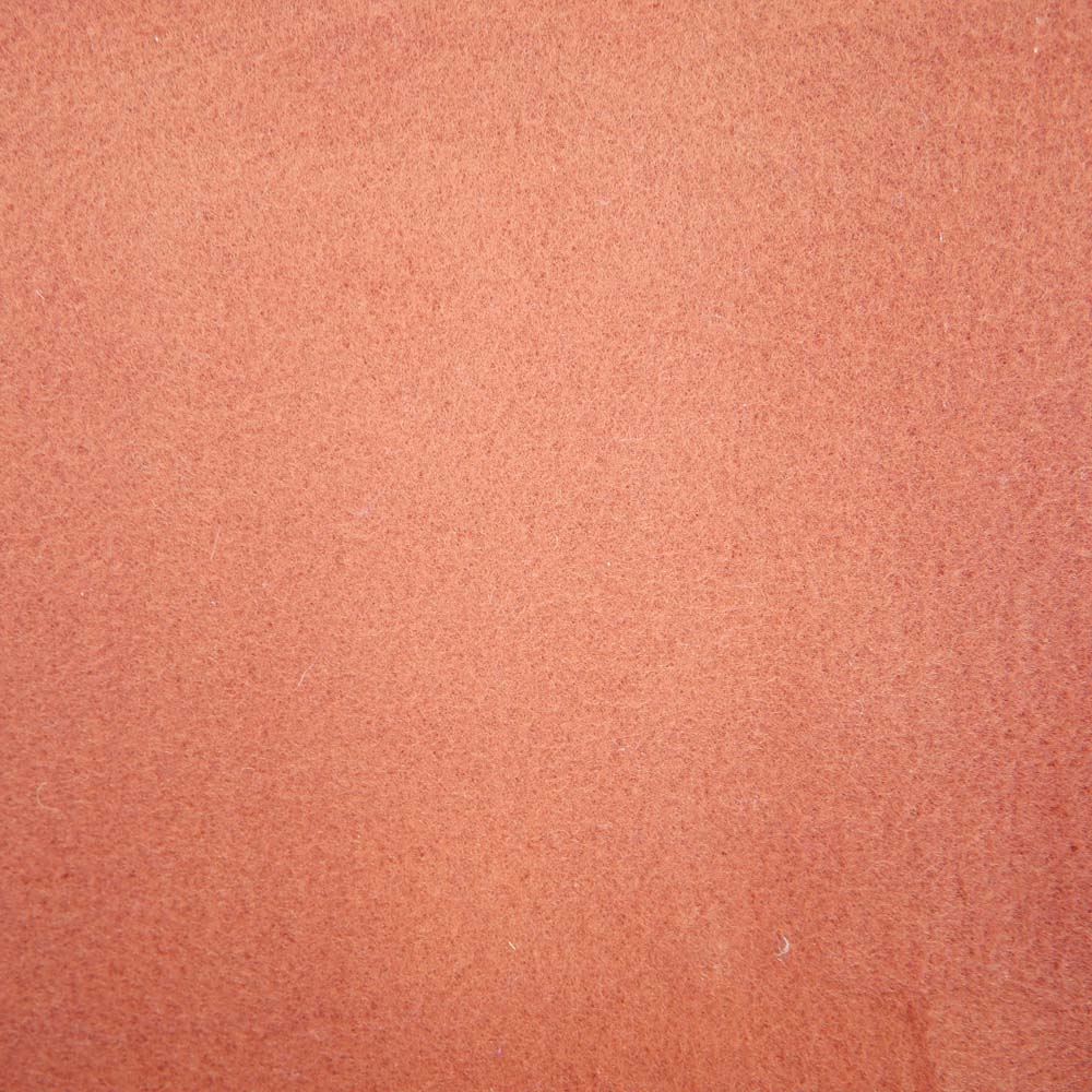 Close up of burnt orange picnic rug